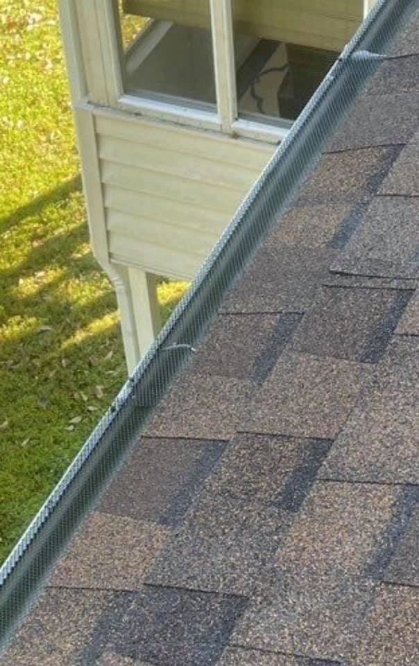 Roll Lock gutter topper installed on roof edge